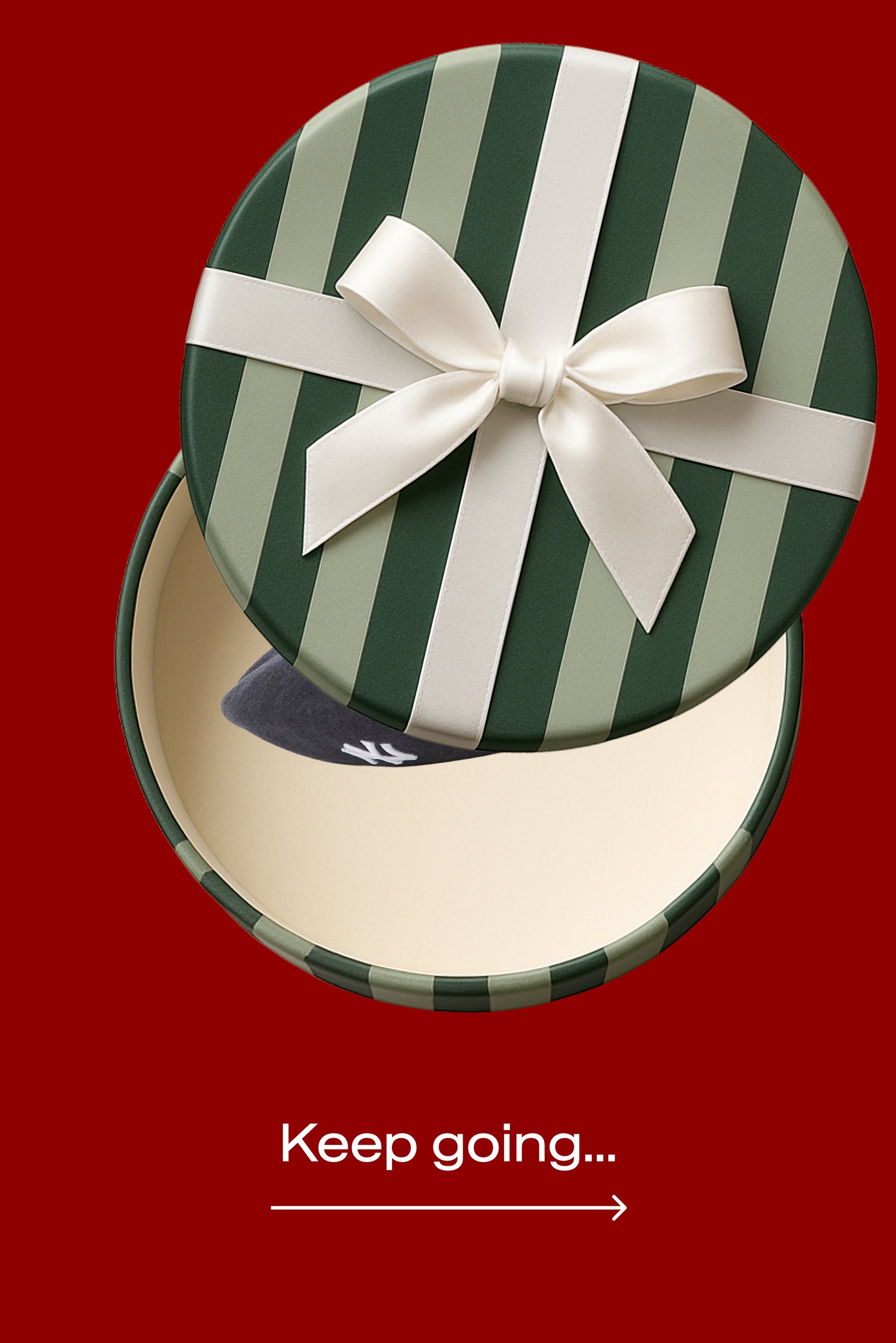 Round green gift box with vertical stripes and white bow, lid slightly open showing a dark baseball cap inside on red background with the text "Keep going..."