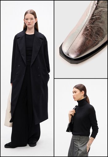 Zwarte dubbelrijige jas, zwarte top en wijde broek; close-up van metallic zilveren enkelboot met een hexagonale zool; model in zwarte coltrui.