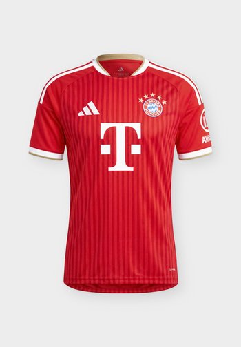 Rotes FC Bayern München Fußballtrikot mit weißem Adidas-Logo, Telekom als Sponsor, Stern-Emblemen über dem Vereinswappen und weißem Besatz an Ärmeln und Kragen.