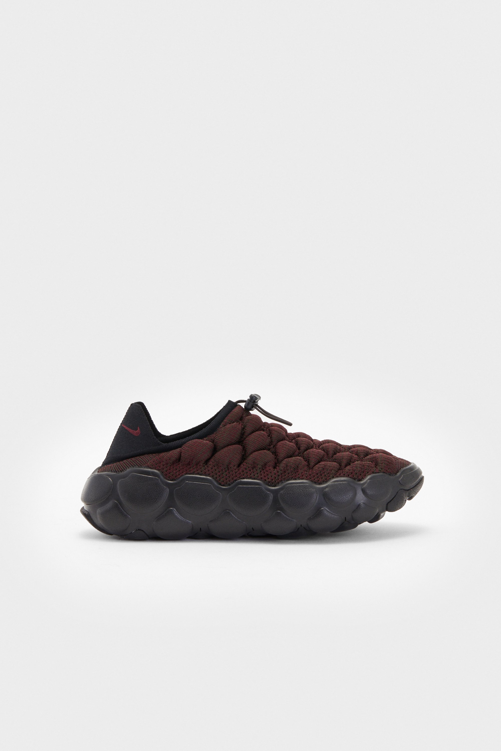 Maroon and black sneaker with a textured, puffy upper and a chunky sole, positioned against a plain white background.