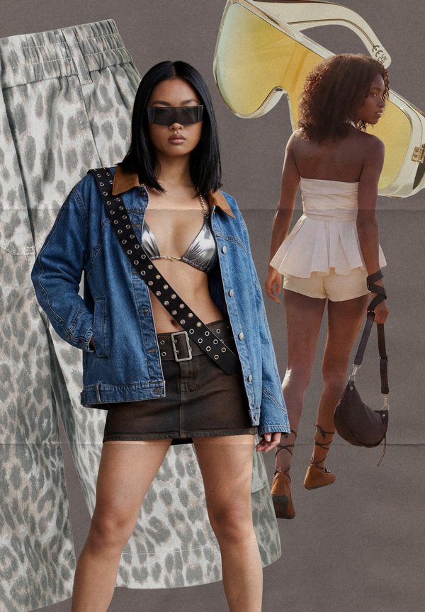 Giovane donna con giacca di jeans, top bikini metallico, gonna nera e occhiali da sole sta davanti a un'altra donna con un outfit bianco che tiene una borsa nera.