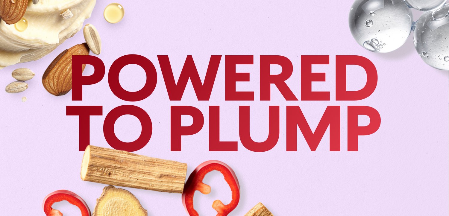 Red text "POWERED TO PLUMP" with natural ingredients like almonds, red pepper slices, ginger, and clear bubbles on a light purple background.