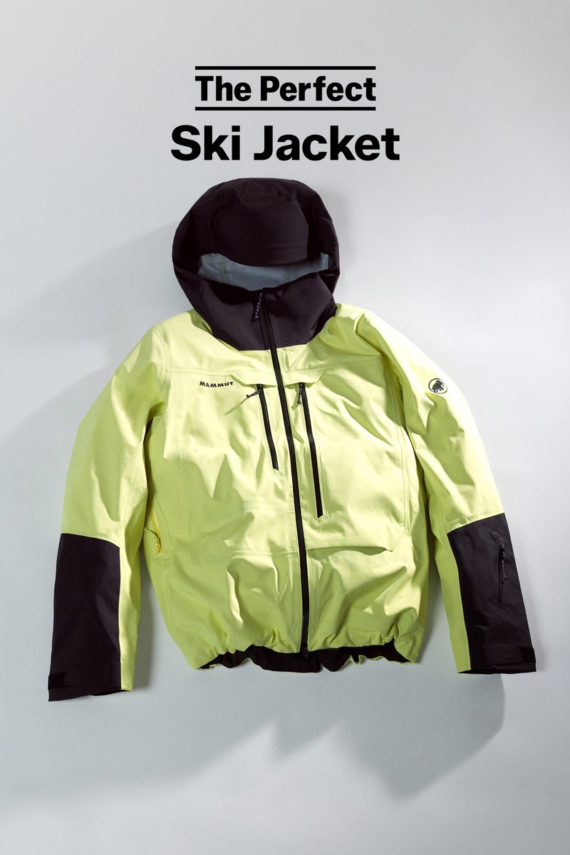 Yellow and black Mammut ski jacket with front zip, chest pockets, hood, and logo on left sleeve, displayed on a light background.
