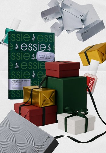 Green Advent calendar with "essie" logo, surrounded by red, gold, and white gift boxes. Includes a nail polish bottle and silver tags.