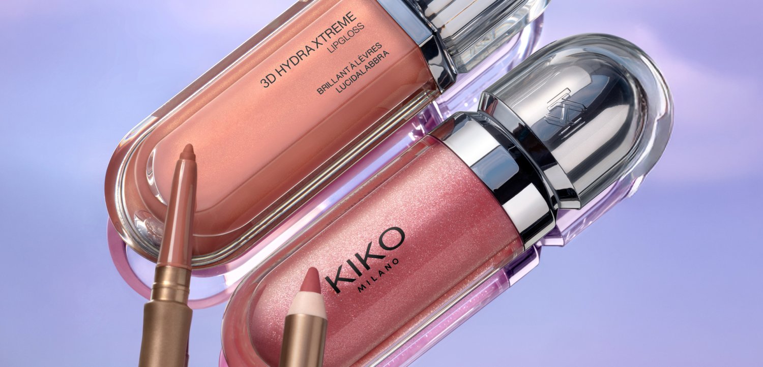 Two pink lip makeup products with applicator tips, labeled 3D Hydra Xtreme lipgloss and KIKO Milano, on a purple background.
