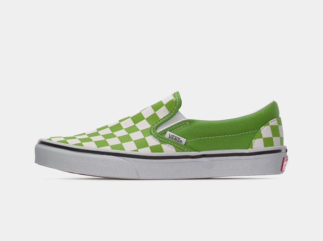 Green and white checkered slip-on Vans sneaker with white sole and black stripe detail, side view.