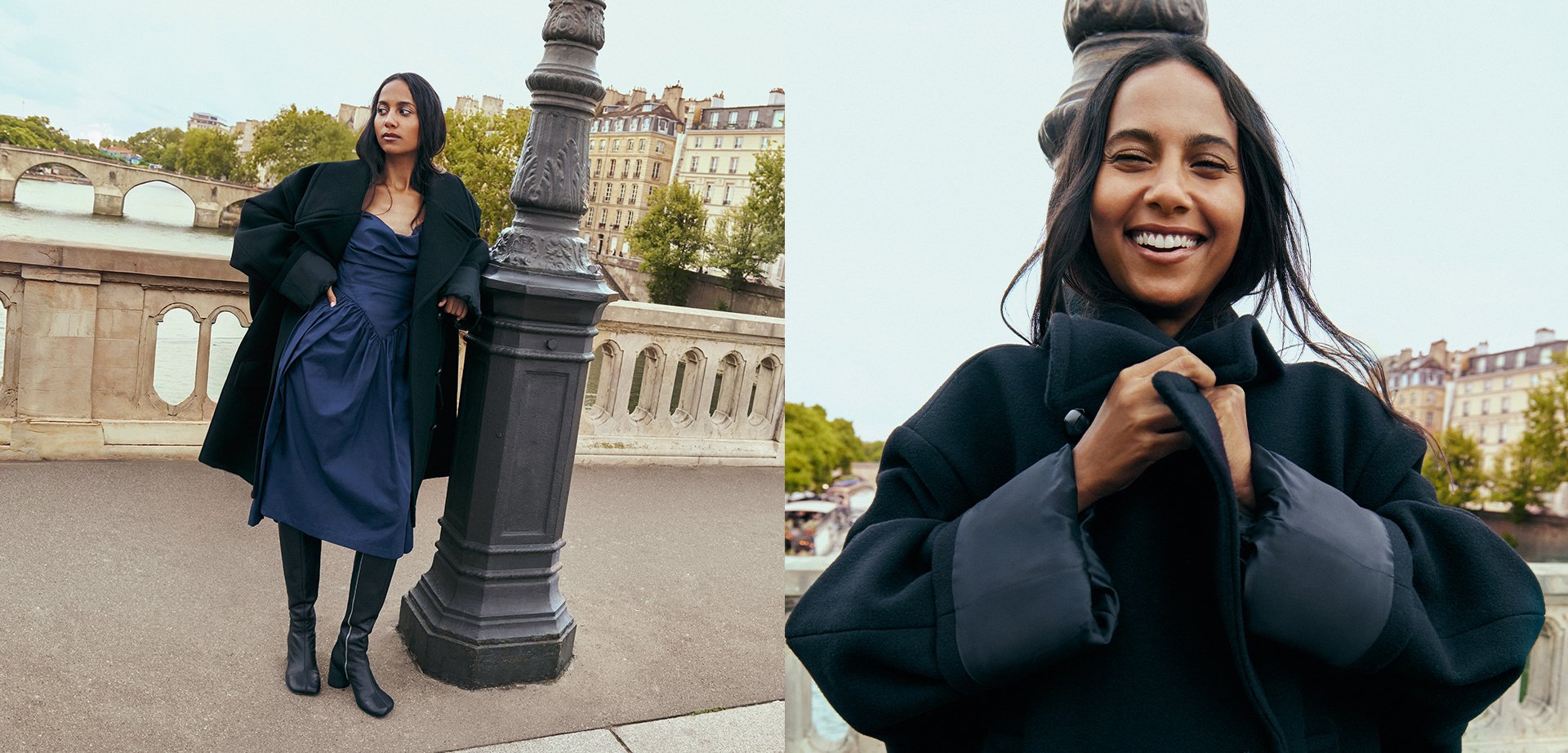 Black coat with an oversized design, navy dress underneath, paired with knee-high black boots. Smooth texture, minimal hardware, standing by a bridge.