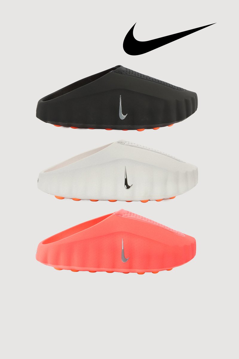 Three pairs of Nike sandals: black, white, and bright coral. Each features a rounded design with textured surfaces and logos on the side.