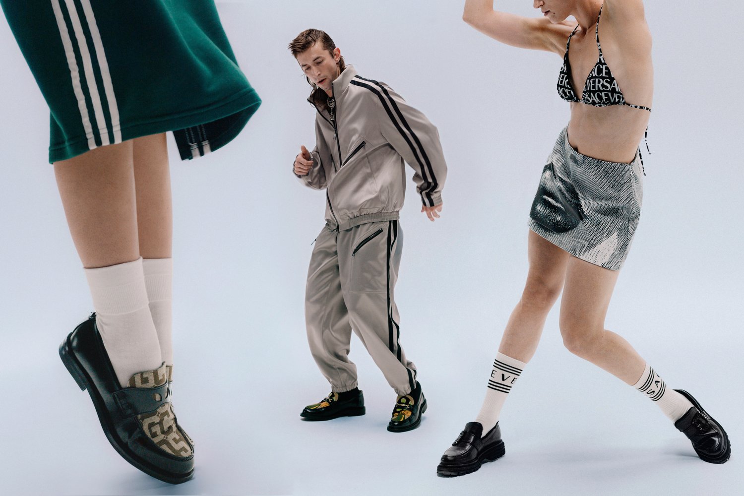 A man in a beige tracksuit and a woman in a black printed bikini and silver skirt strike dynamic poses, showcasing stylish footwear.