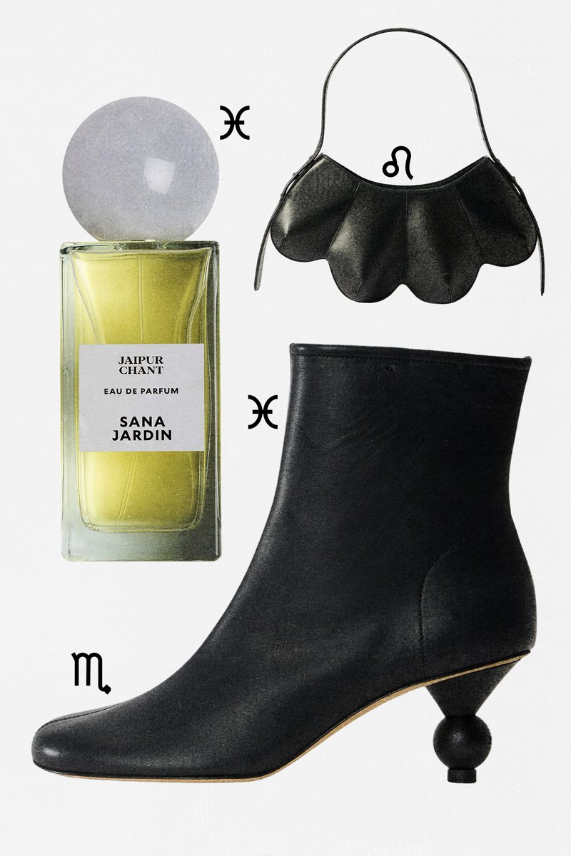 Black leather ankle boot with a distinctive rounded heel, scalloped leather handbag, and yellow perfume bottle with a round cap.
