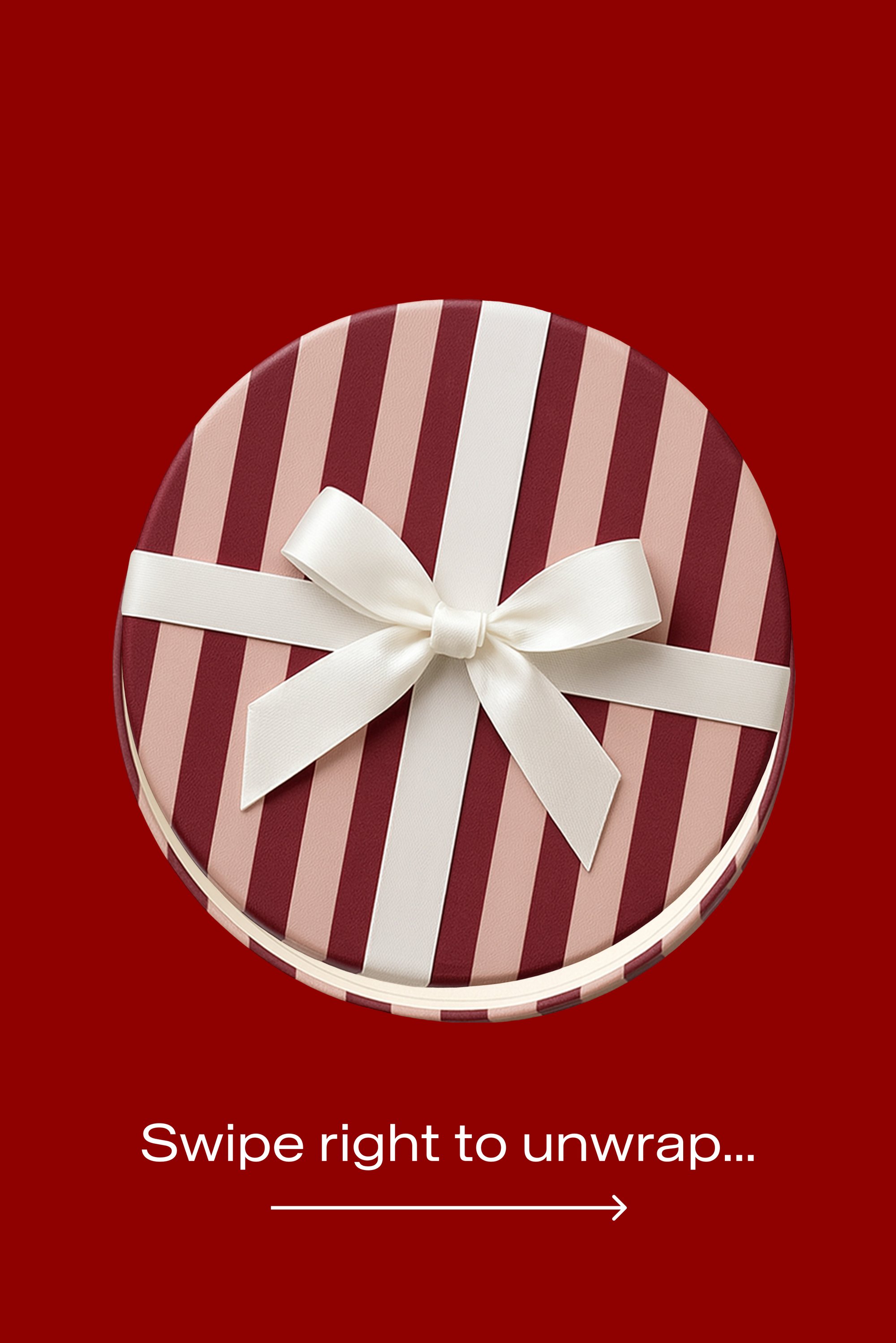 Caja de regalo redonda con rayas en rosa y burdeos, coronada con un lazo blanco, sobre un fondo rojo. Texto que indica deslizar hacia la derecha para desenvolver.
