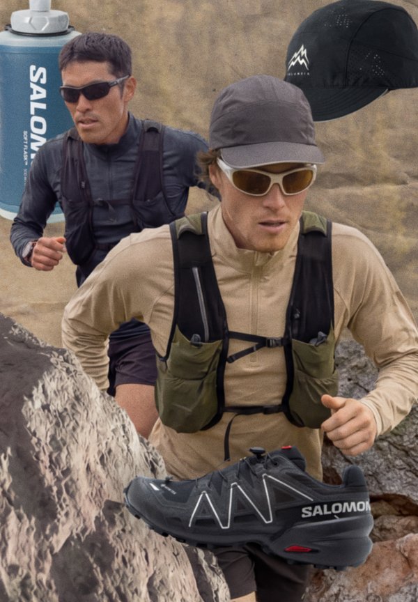 Du vyrai bėgioja kalnų trasoje akmenuotu reljefu, dėvi kepures, saulės akinius, hidracines liemenes ir Salomon bėgimo takų batelius.