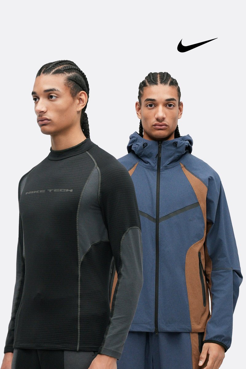 To modeller bærer atletisk tøj. Den venstre har en sort langærmet, tekstureret top med grå accenter; den højre en blå og brun lynlåsjakke med hætte.