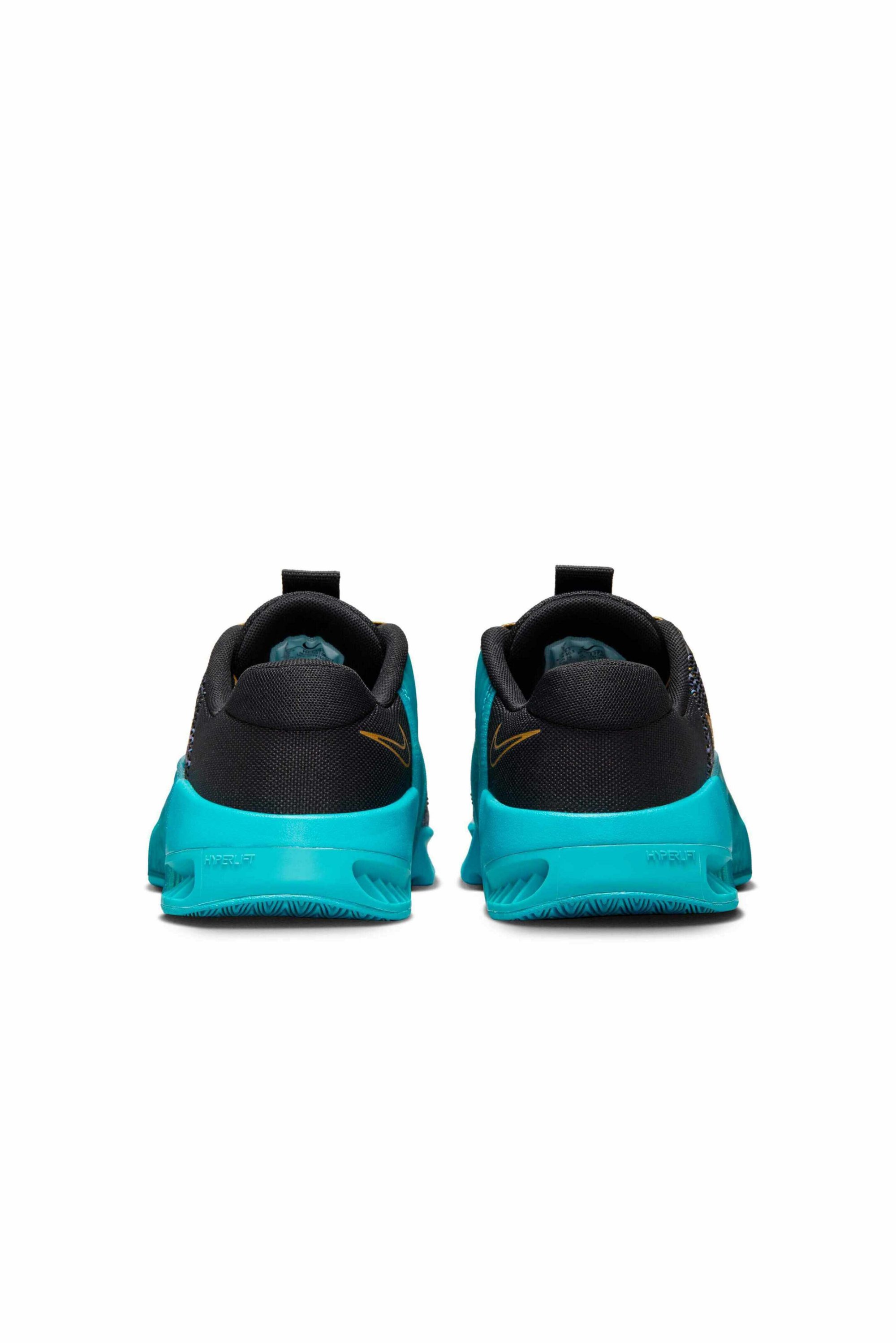 Zapatillas deportivas negras y turquesas con una parte superior texturizada, acentos tonales contrastantes y una tira trasera. Suela de goma ligera.