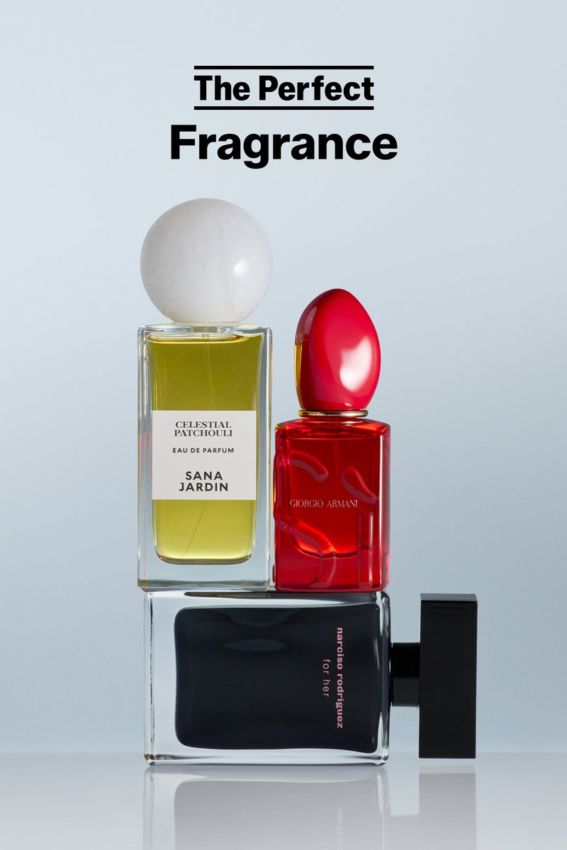 Stacked perfume bottles with clear, red, and black glass under bold text reading "The Perfect Fragrance" on a pale blue background.