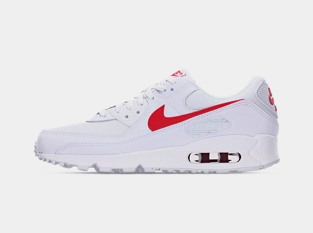 Tênis branco Nike Air Max com logótipo Swoosh vermelho, amortecimento de ar visível e sola texturizada, mostrado do lado direito.