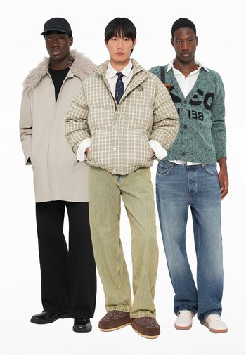 Three models are wearing outerwear: a light gray coat, a plaid puffer jacket, and a green sweater with text, paired with wide-leg jeans.