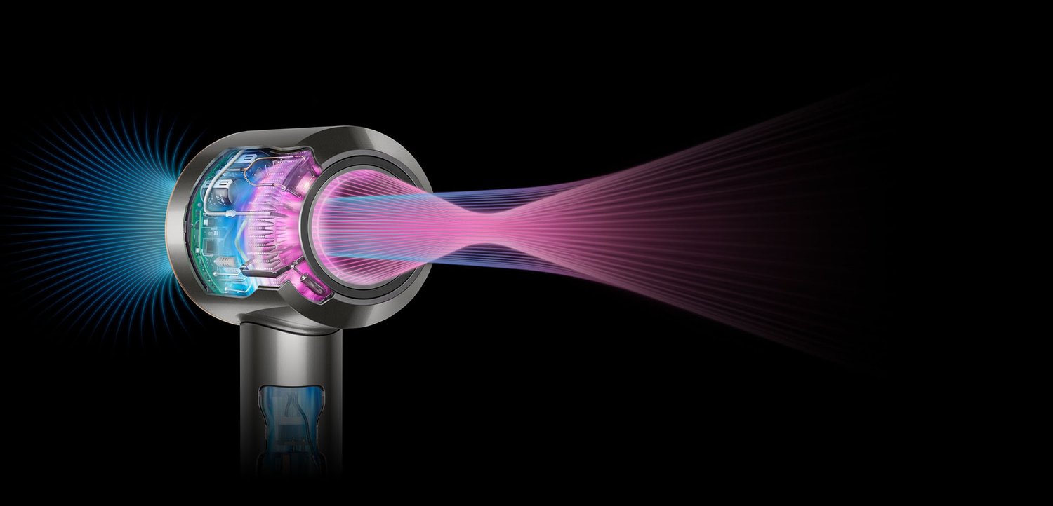 Föhn met zichtbare interne componenten die gerichte roze en blauwe luchtstromen uitstoten tegen een zwarte achtergrond.