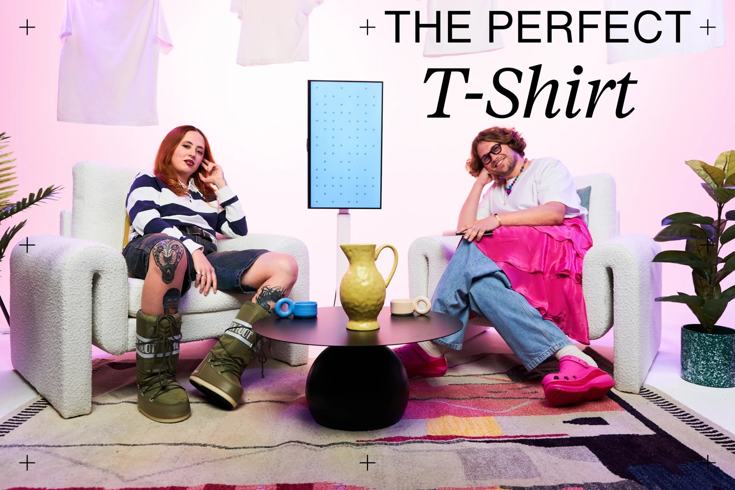 Two individuals sit on stylish chairs, surrounded by colorful decor. A light blue screen displays patterns, with clothing and a pitcher on the table.