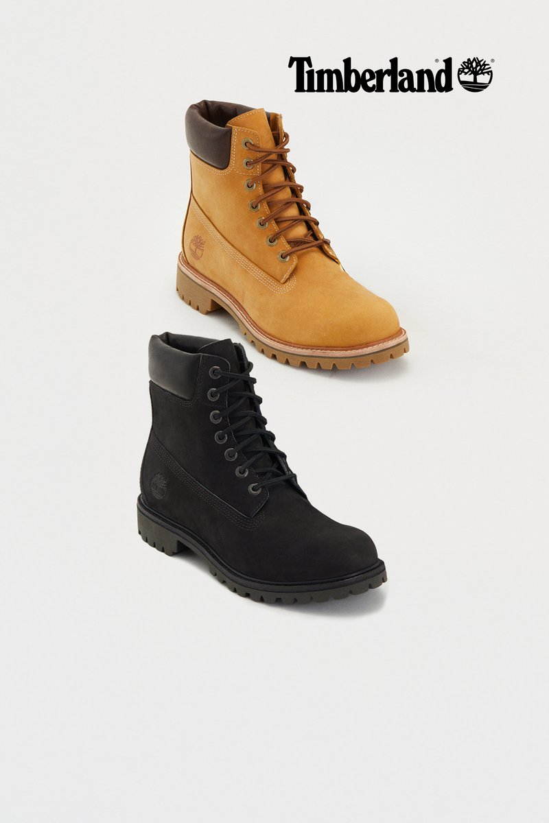 Botas Timberland en marrón y negro con diseño de cordones, cuellos acolchados y materiales texturizados. Presenta el logo en el lateral y suelas resistentes.