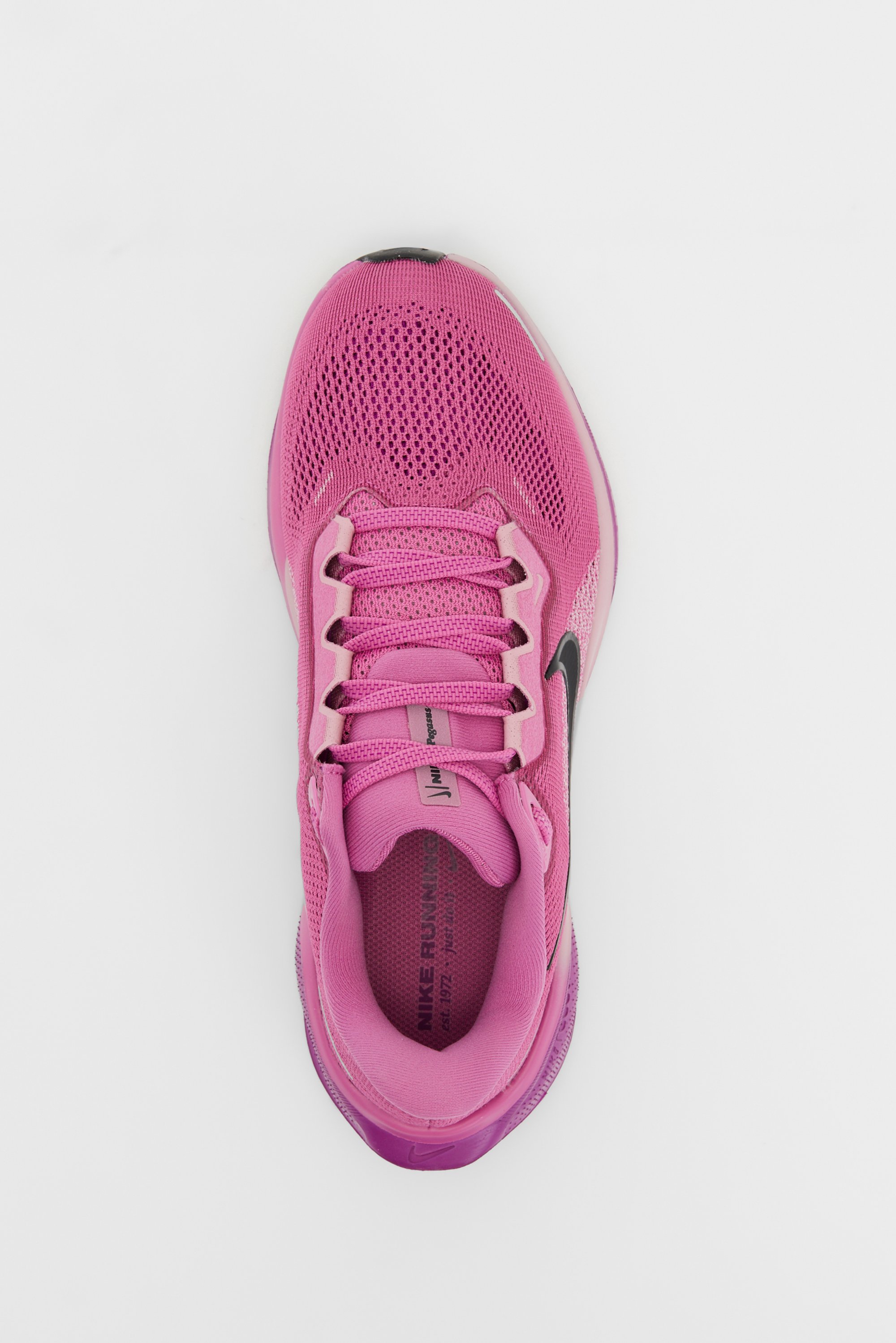 Pink athletic shoe with mesh fabric, prominent laces, and a black swoosh logo, centered against a plain white background.