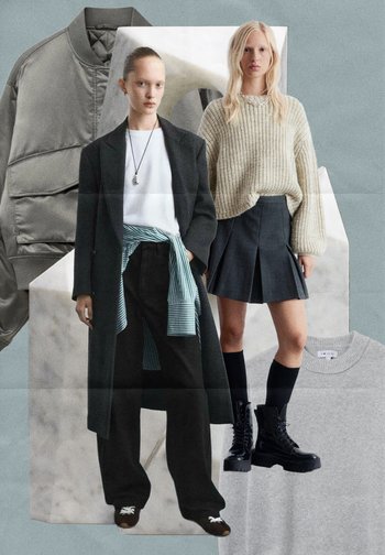 Dvi moterys, vilkinčios sluoksniuotą rudens madą: viena juodą paltą ir platėjančias kelnes, kita – smėlio spalvos megztinį, klostuotą sijoną ir juodus batus.