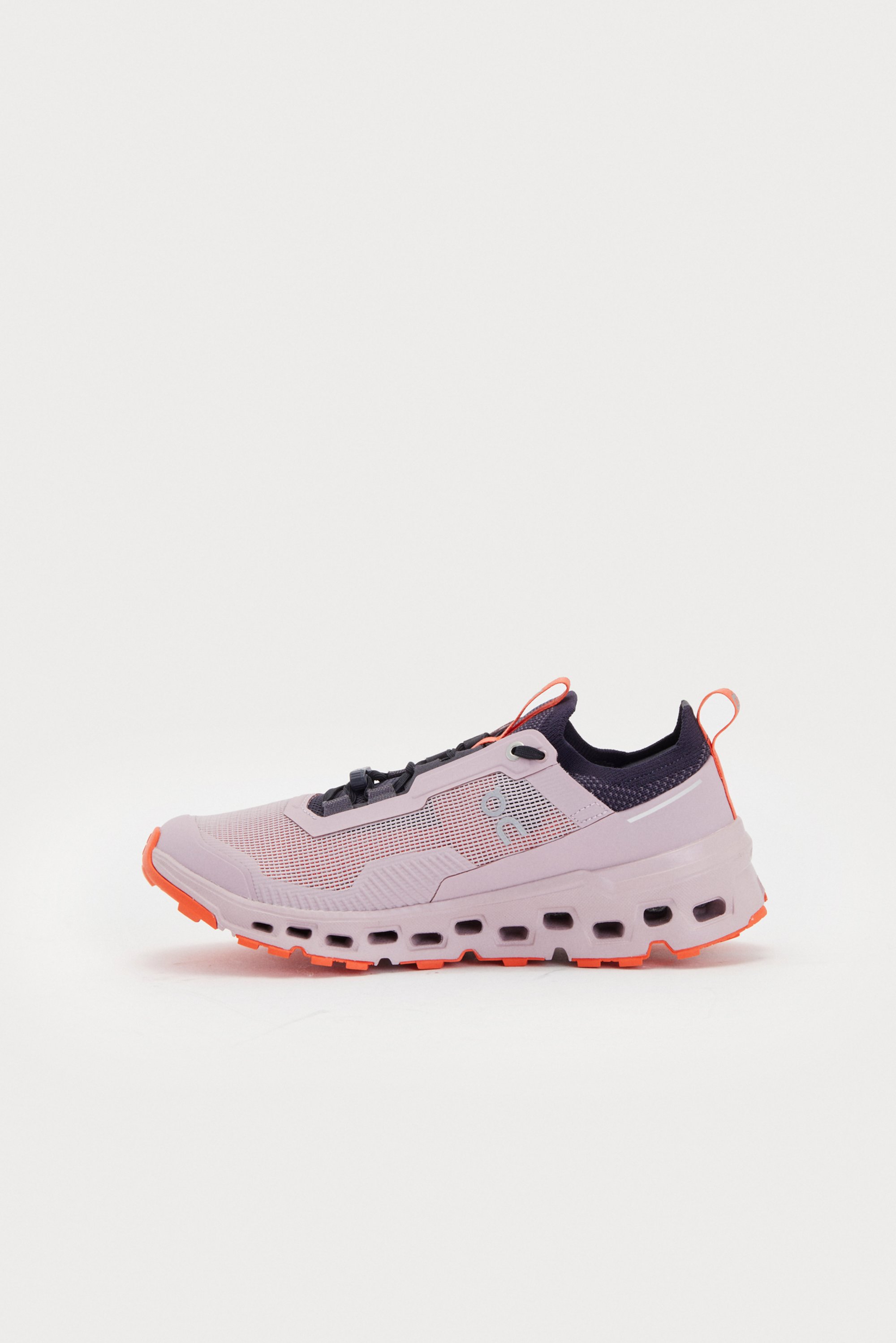 Light purple athletic shoe with orange accents, featuring a textured upper, lace-up closure, and a thick, cushioned sole.