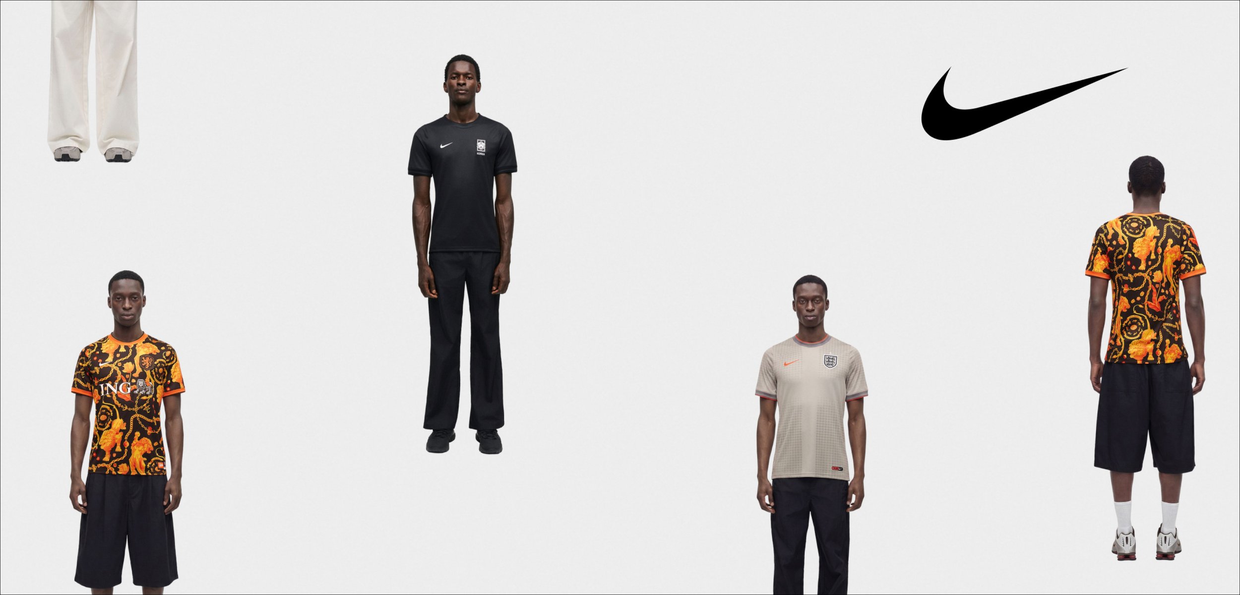 Vier Männer, die verschiedene Nike-Sportoutfits tragen, stehen vor einem weißen Hintergrund mit einem schwarzen Nike-Logo oben rechts.