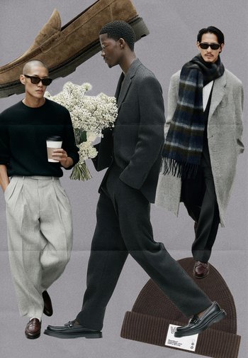 Trei bărbați îmbrăcați modern: unul cu un pulover negru și pantaloni plisati gri deschis, altul într-un costum închis cu flori, iar ultimul cu o haină gri deschis și o eșarfă. O căciulă maro și pantofi loafer sunt evident afișate.