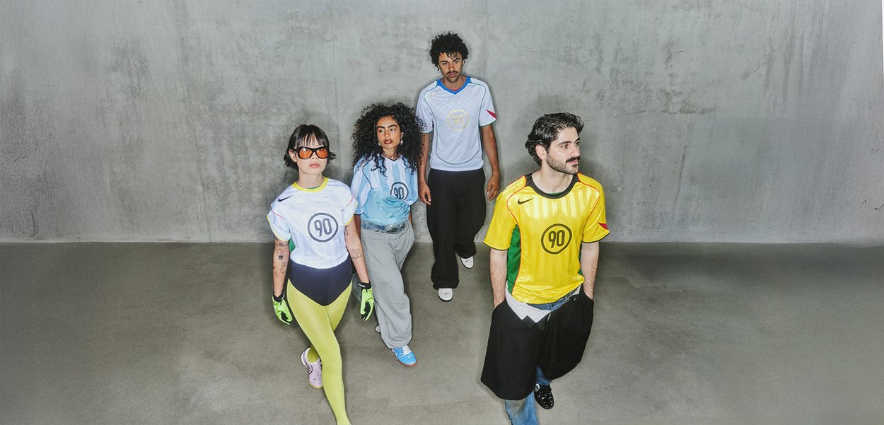 Four individuals wear colorful athletic jerseys in blue, yellow, and white with bold numbers, paired with casual attire and accessories.