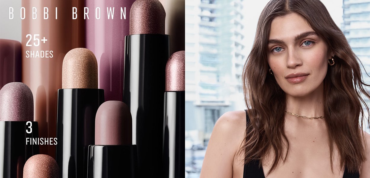 Bobbi Brown cosmetic sticks in over 25 shades, featuring three finishes. The packaging is black with rounded tops showcasing varying colors.