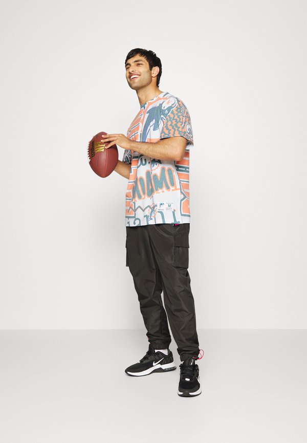 New Era CARGO TRACK PANT Tracksuit bottoms black Zalando.co.uk