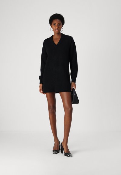 black v neck sweater dress Cable Knit V-Neck relaxed enough for everyday. The Black V Neck Contrast