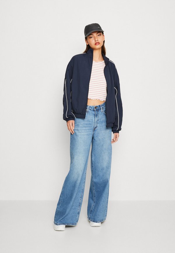 Nike Sportswear CLUB UNISEX Pet black/zwart Zalando.be