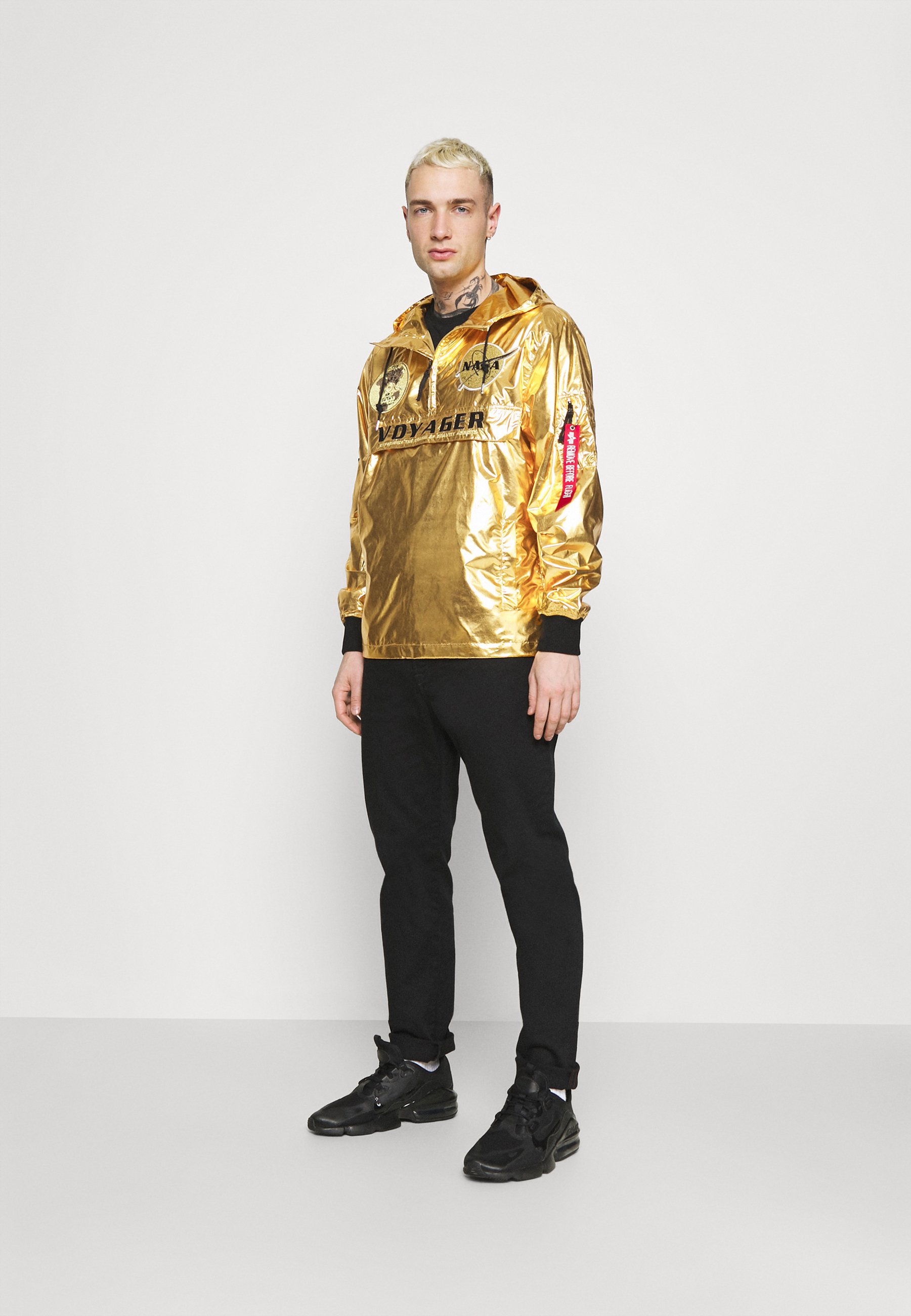 gold windbreaker