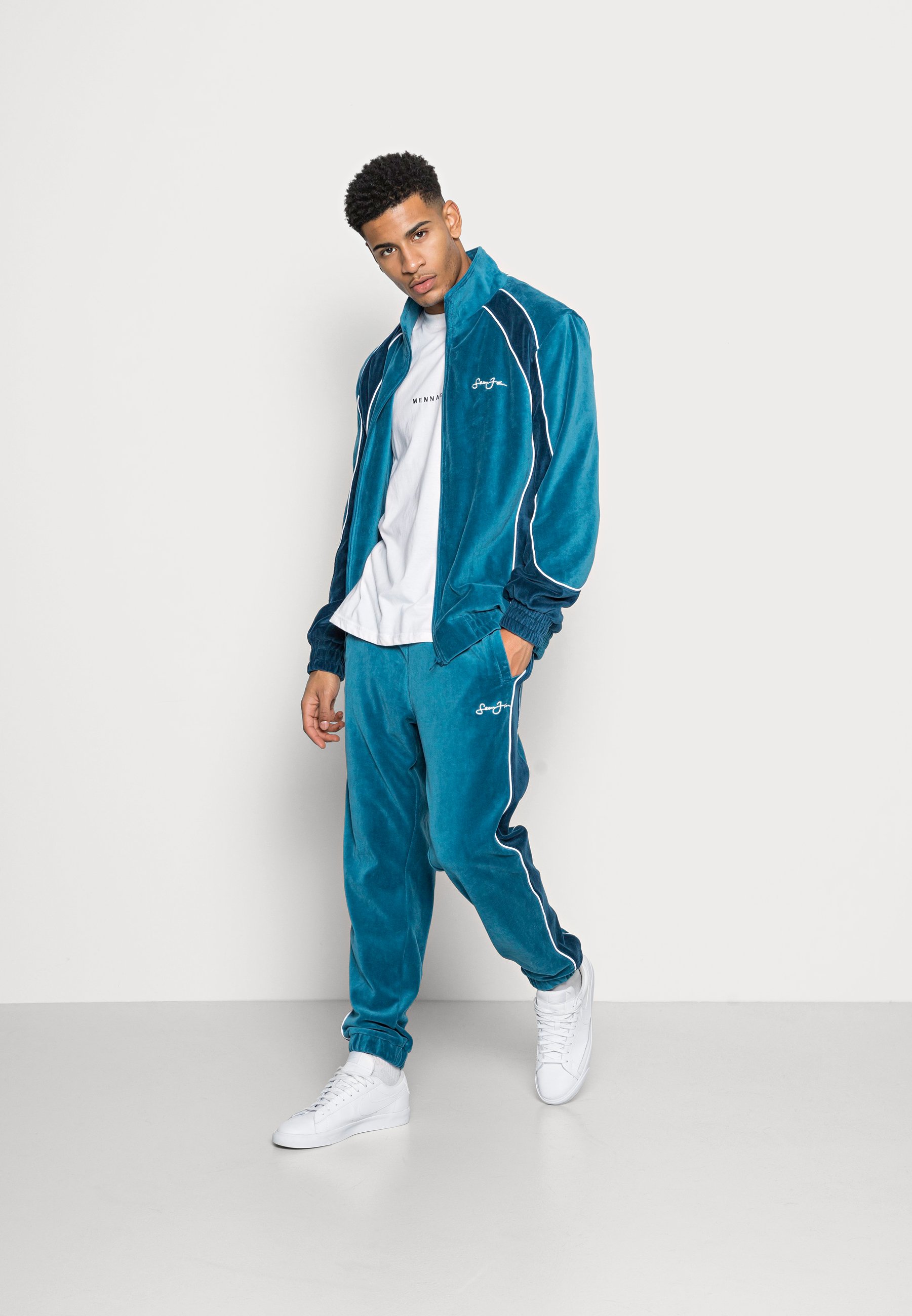 Sean John SCRIPT LOGO COLORBLOCK VELVET TRACKJACKET - Giacca sportiva -  light petrol/petrolio - Zalando.it
