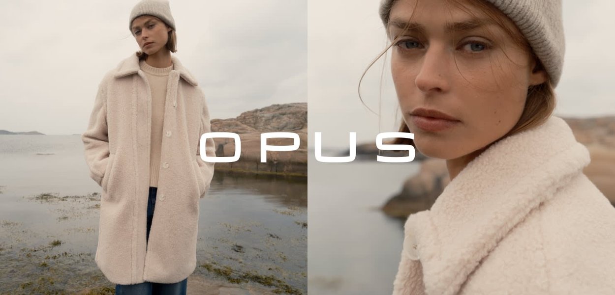 Beige, oversized fleece jas met een kraag en knoopsluiting. Geribbelde, lichtgrijze beanie. Zachte textuur, geschikt voor koude weersomstandigheden.