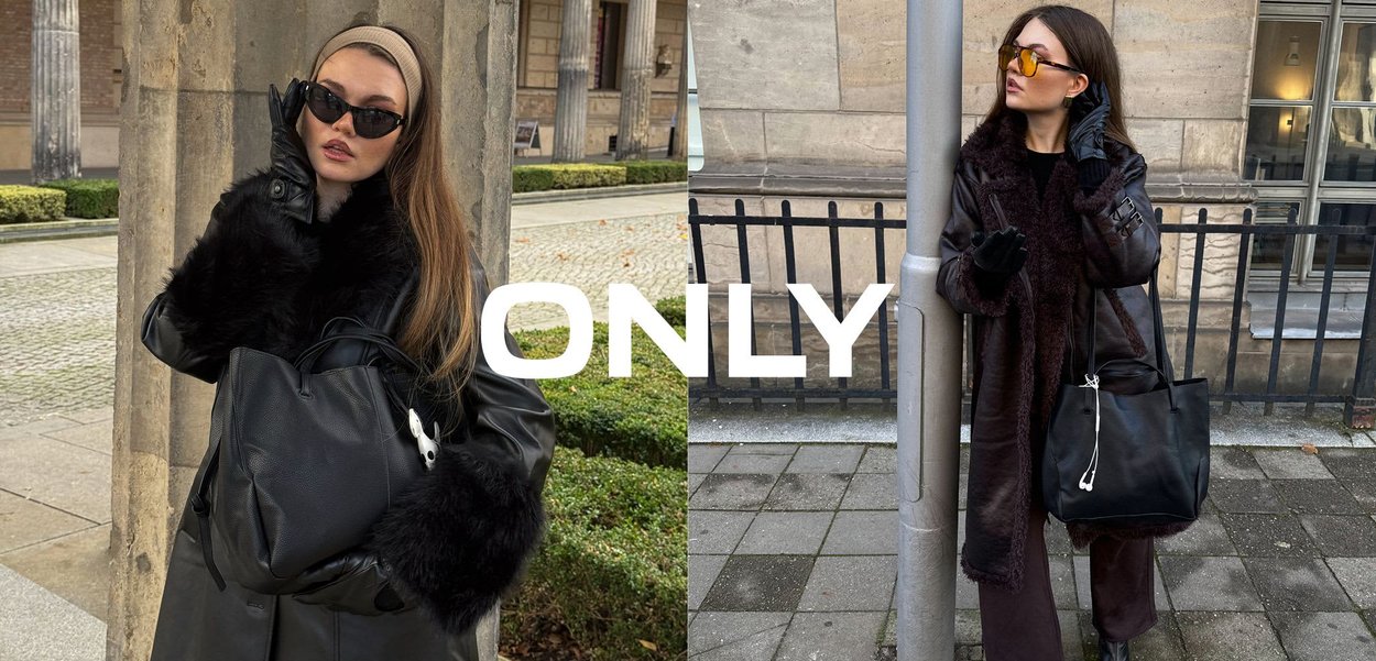 Schwarze Ledertasche mit einer strukturierten Oberfläche, verziert mit einem Fellbesatz. Ein Paar dunkle Sonnenbrillen und schwarze Lederhandschuhe vervollständigen das Outfit.