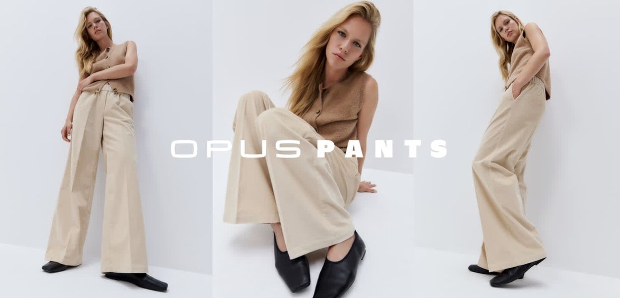 Beige wide-leg pants with a high-waisted design and front pleats, paired with a light brown sleeveless top, against a white background.