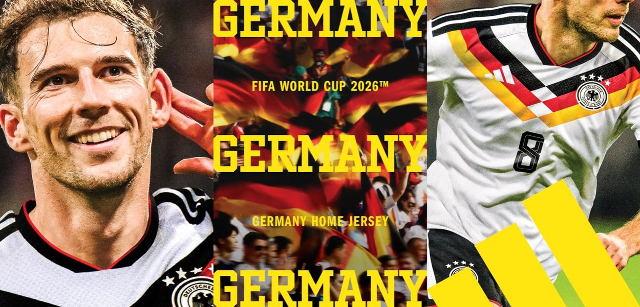 Smiling soccer player in Germany’s white jersey with black, red, and yellow stripes, fans waving German flags in the background.