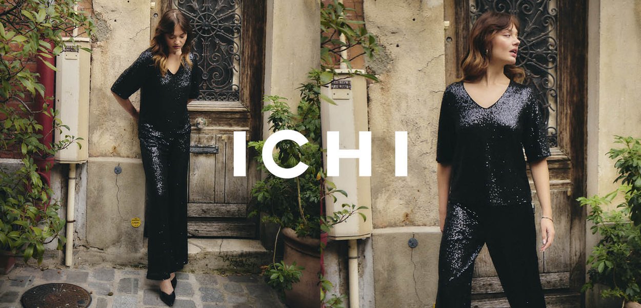 Schwarzes, mit Pailletten besetztes Oberteil mit kurzen Ärmeln, kombiniert mit passenden Pailletten-Hosen. Das Outfit verfügt über ein V-Ausschnitt-Design und eine figurbetonte Silhouette.