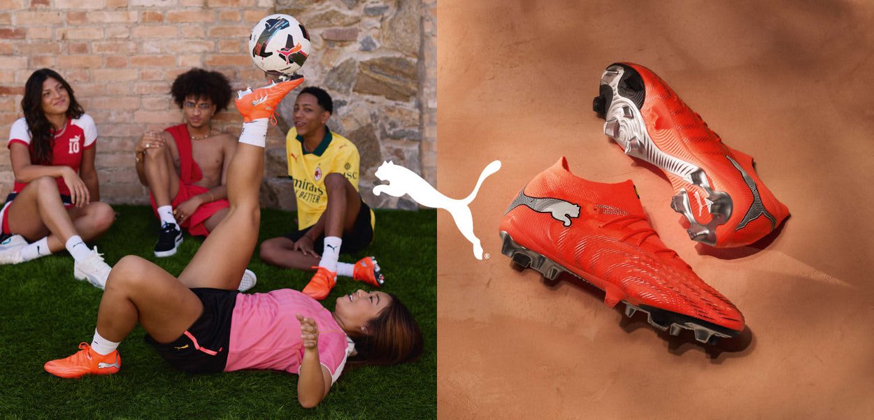 Scarpe da calcio Puma di un arancione brillante con superficie testurizzata, dettagli neri e tacchetti metallici per la trazione, esposte su uno sfondo neutro.
