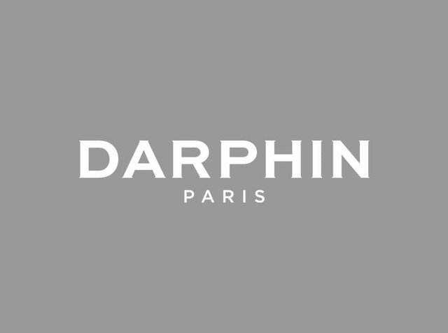 Merknaam "DARPHIN" in grote witte letters met "PARIS" eronder op een grijze achtergrond.