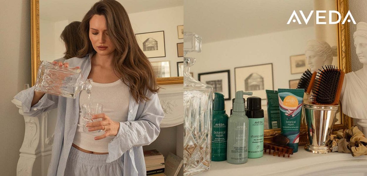 Klart glasskanne som heller vann i et glass; lyseblå stripete pysjamas; Aveda-produkter som inkluderer sjampo, balsam og en børste på en hylle.