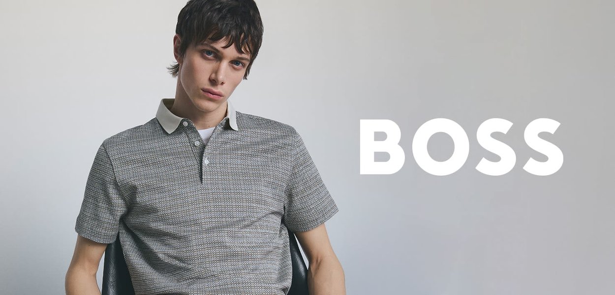 Short-sleeve polo shirt in a textured grey fabric with a contrasting white collar and buttons, featuring a subtle geometric pattern.