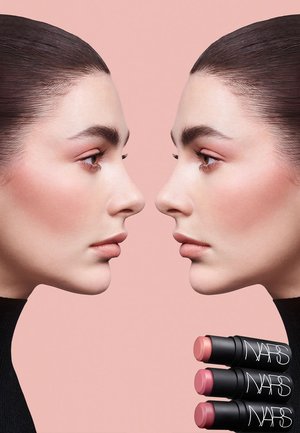 Two faces in profile against a pink background, displaying soft features. Three NARS blush sticks in black packaging with white text below.