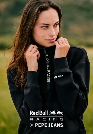 Black zip-up sweatshirt featuring "RED BULL RACING" and "PEPE JEANS" logos. Soft fabric, standard fit, high collar, and long sleeves.