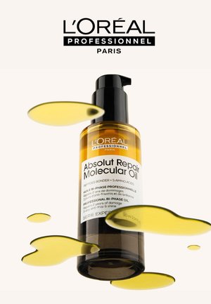 L'Oréal Professionnel Absolut Repair Molecular Oil in a clear pump bottle. Rich gold liquid with a glossy finish, labeled for bi-phase use.