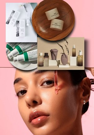 Gros plan sur une femme appliquant un sérum avec un compte-gouttes, entourée de divers flacons, tubes et pots de produits de soin sur des fonds neutres.