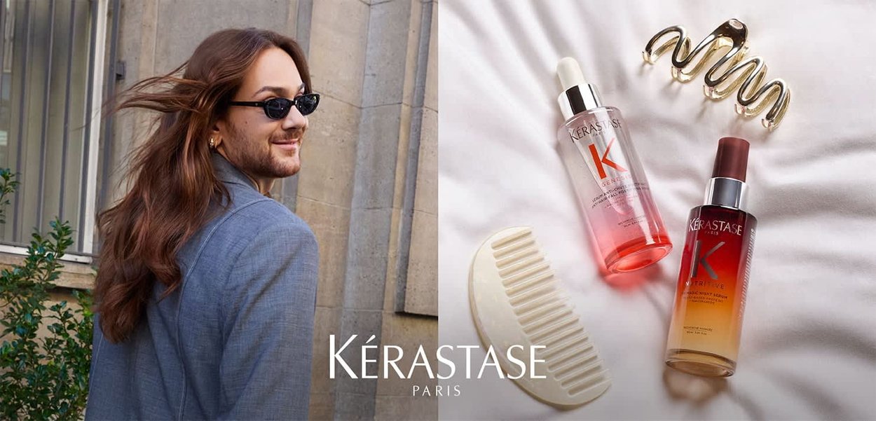 Kérastase-Haarpflegeprodukte, darunter ein pinkes Serum, ein braunes Serum, ein beiger Kamm und eine goldene Haarklammer vor einem hellen Hintergrund.